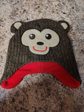 Qhealthtex Brown Monkey Knit Earflap Hat with Red Accent And Santa Beanie
